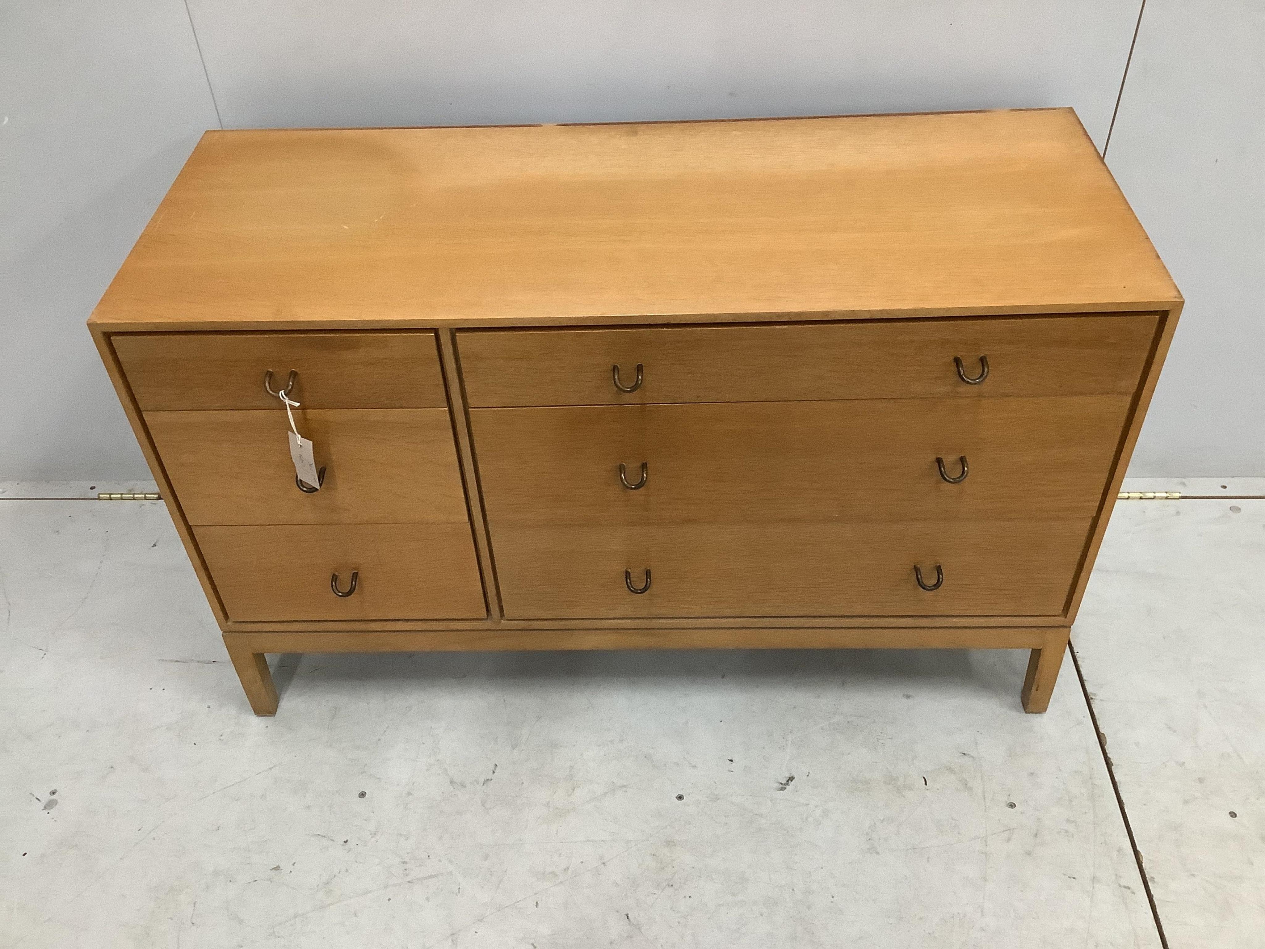 A mid century oak six drawer chest by John and Sylvia Reid, width 112cm, depth 43cm, height 70cm. Condition - fair